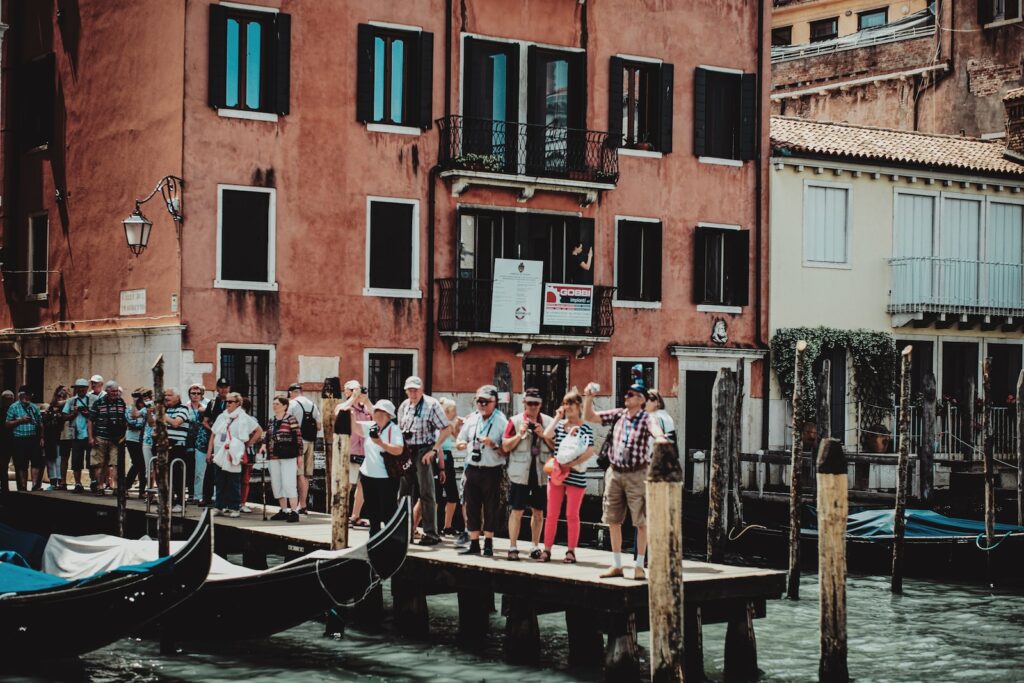 people on boat on water during daytime